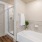 a bathroom with a tub and shower