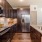 a kitchen with black appliances