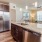 a kitchen with a marble island
